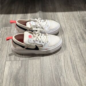 Womans White and Black Nike Sneakers